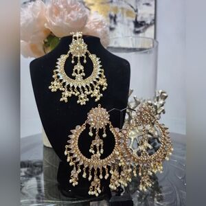 Elegant Gold Chandelier Earrings and maang tika.